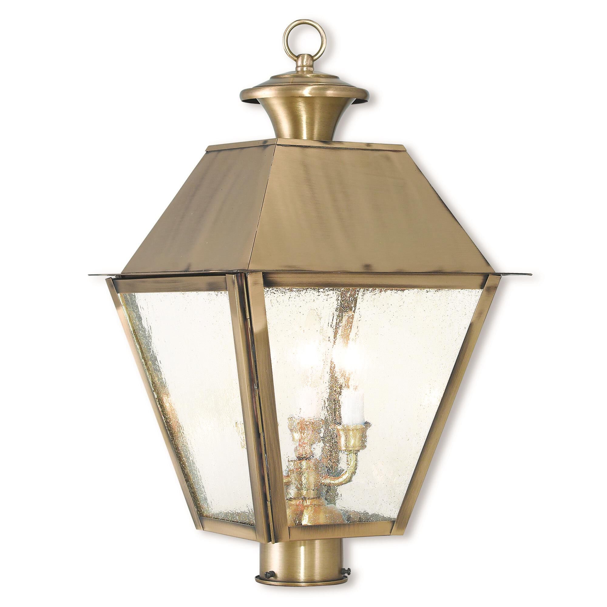 Shown in Antique Brass finish and Seeded glass